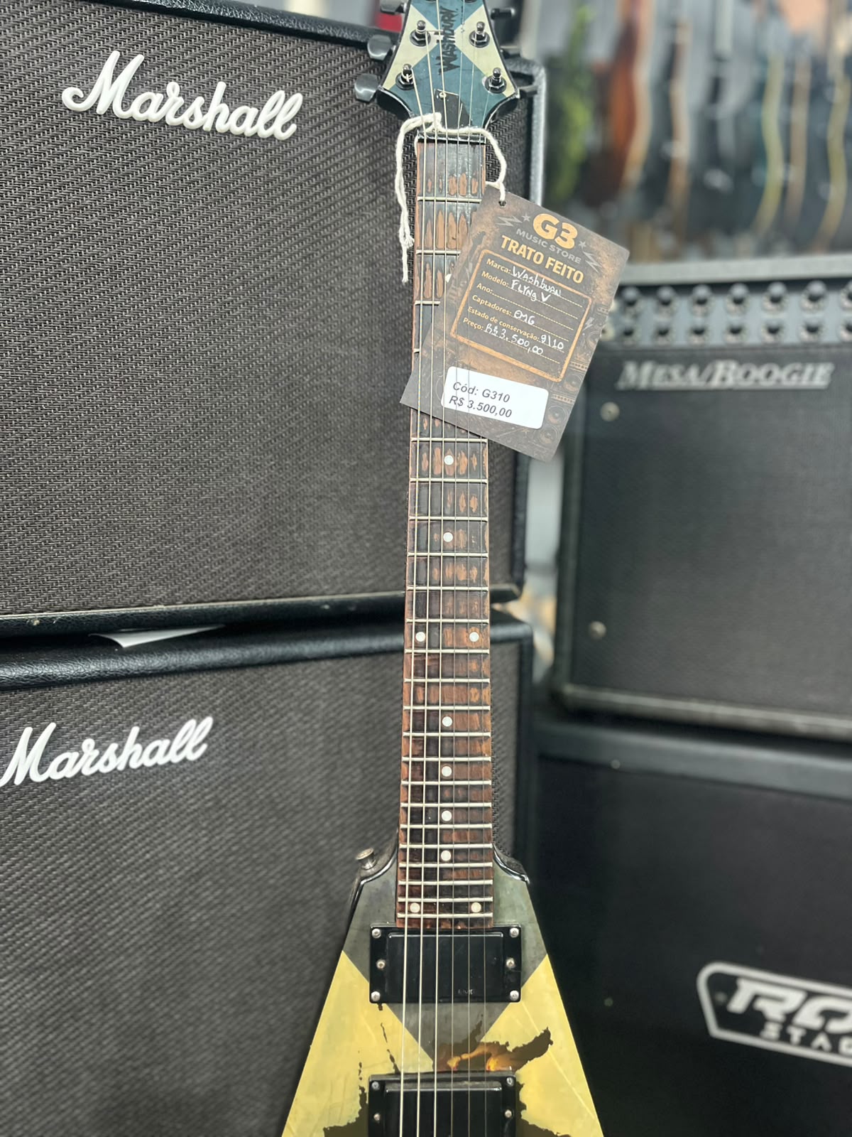 Guitarra Marca Washburn – Modelo: Flyng V cap emg miniatura 4