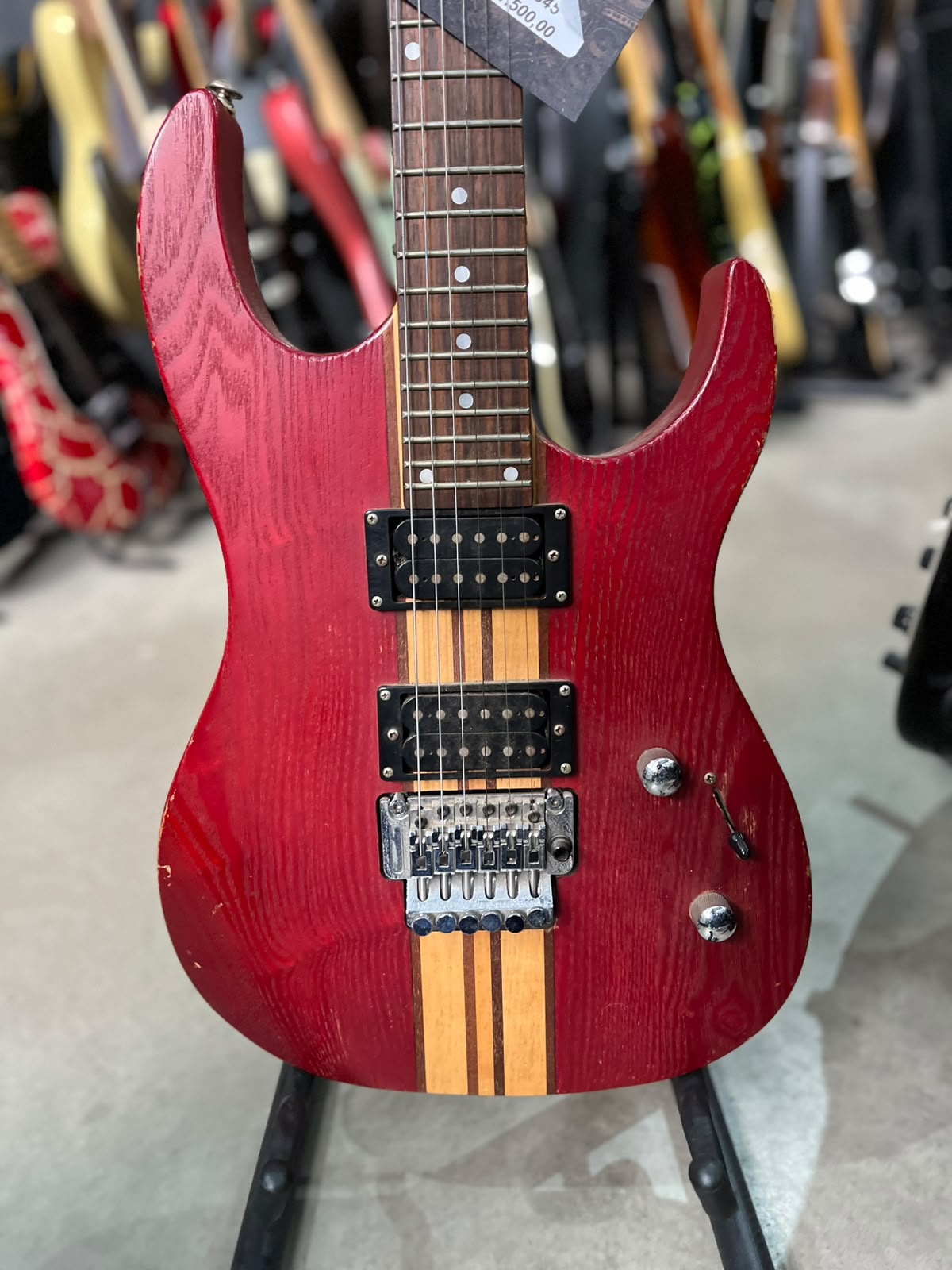 Guitarra Eagle Madeira vermelha com floyd e listra amarela